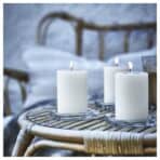 JÄMLIK Scented pillar candle, Vanilla/light beige, 30 hr - Image 3