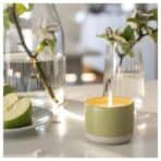 LÖVSKOGSLUND Scented candle in ceramic jar, Apple/bright beige-yellow, 25 hr - Image 3