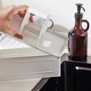 White ice cube tray for freezing water or ice cubes.