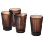 Set of four brown and black striped drinking glasses, perfect for home or restaurant use.
