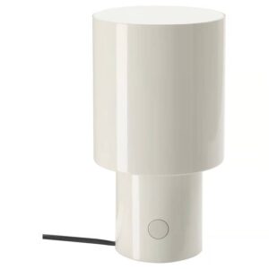 - Stylish white modern table lamp for home decor and interior lighting.