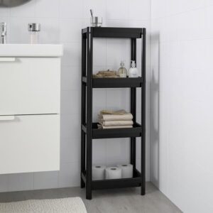 Black bathroom storage rack with shelves for toiletries and essentials.