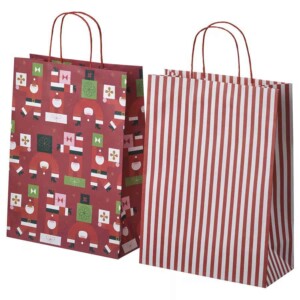 Red Christmas gift bag with mixed patterns, perfect for holiday presents.