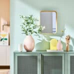 Stylish vases and mirror decor.