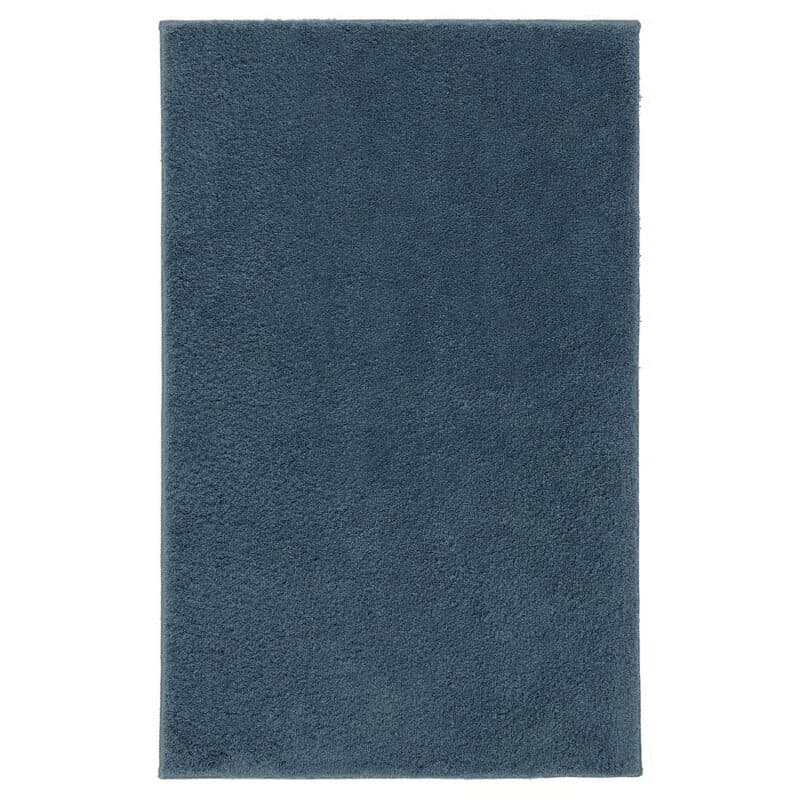 Soft plush blue area rug for living rooms and bedrooms. Durable, stylish, and perfect for modern home decor.
