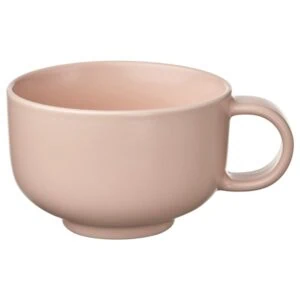 Pink ceramic coffee mug for hot drinks, stylish and durable.
