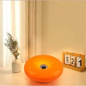 Orange decorative bowl for home decor and table setting.