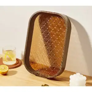Honeycomb glass tray for serving and decoration, stylish and functional kitchen accessory.