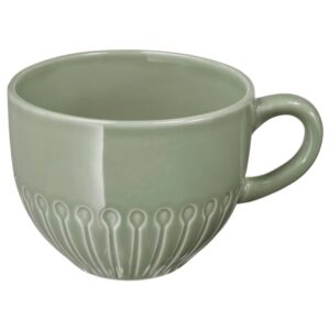 Elegant green ceramic tea cup with a decorative pattern, perfect for coffee and tea lovers.