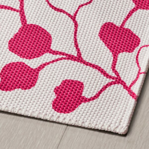 Pink and white flatwoven rug with leaf design, 60x90 cm for home decor.