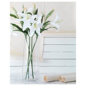 White Lily artificial flowers in a clear glass vase for home decor.