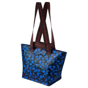 Blue patterned carrier bag with red handles for shopping and carrying items.