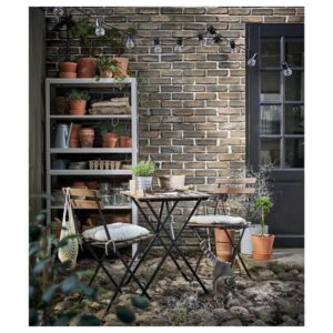 TÄRNÖ Chair, outdoor, foldable black/light brown stained - Image 3