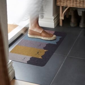 Indoor door mat with colorful cat pattern for home decor.
